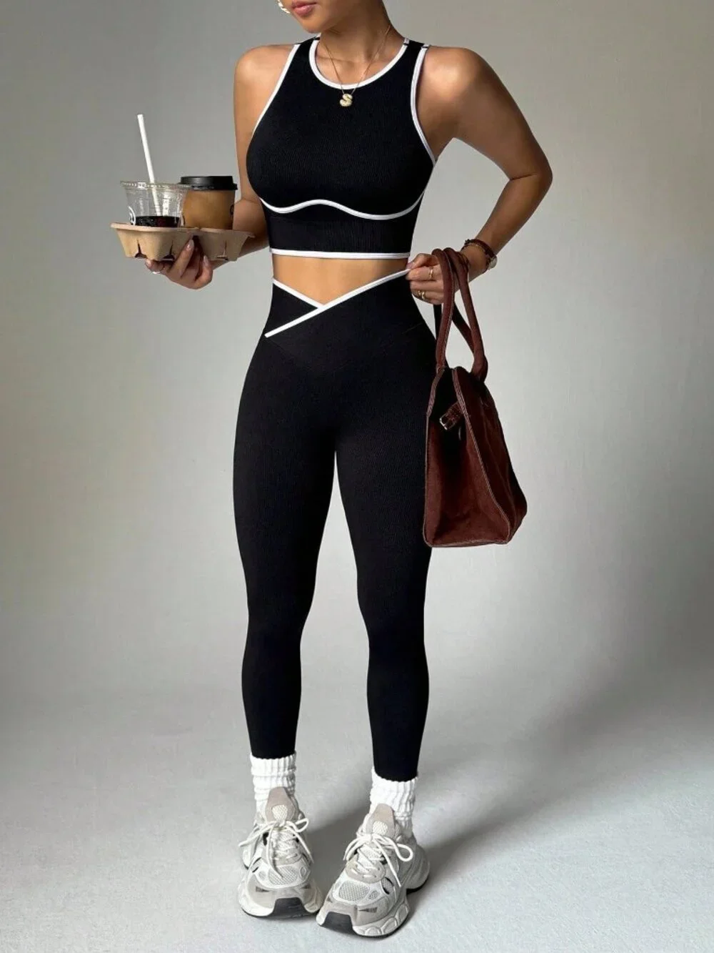 Black Cropped Women's Sports Suit with Tank Top & Asymmetric Waist Leggings